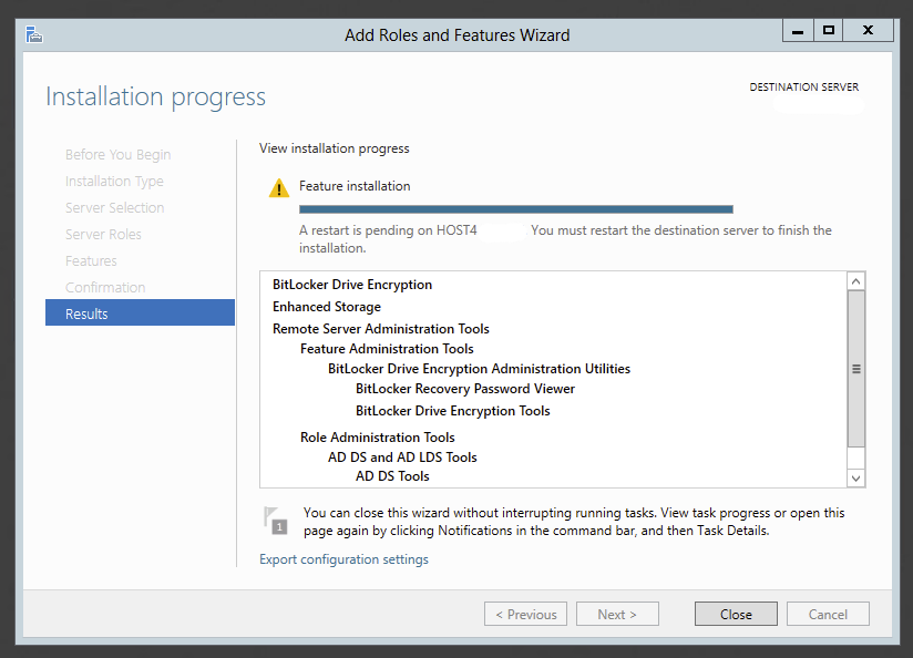 Installation results screen prompting a restart after BitLocker components are installed