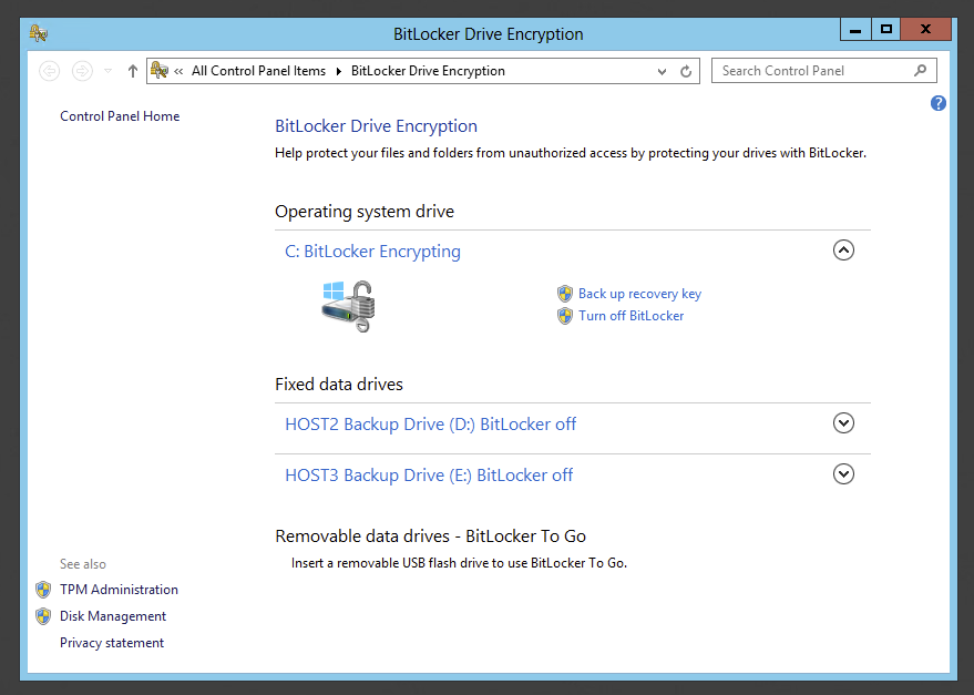 BitLocker Drive Encryption window showing drive C is still being encrypted