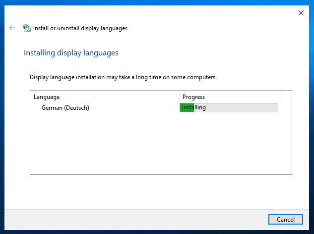 License terms screen in the Windows display language installation wizard.